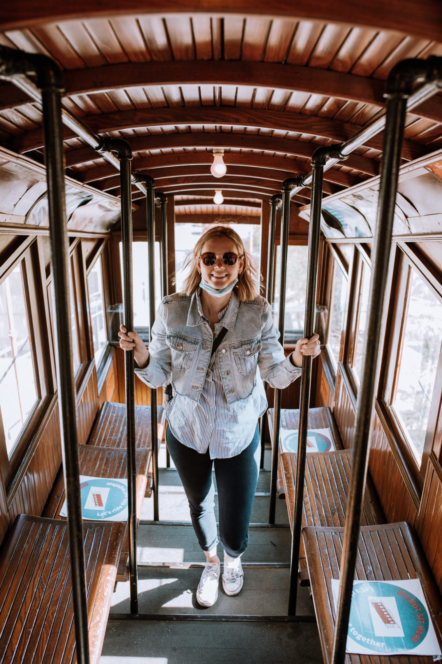 girl standing in a train, itinerary for Los Angeles